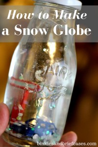 How to make a homemade snow globe in a milk bottle. What a cute winter craft! Love the pencil trick.